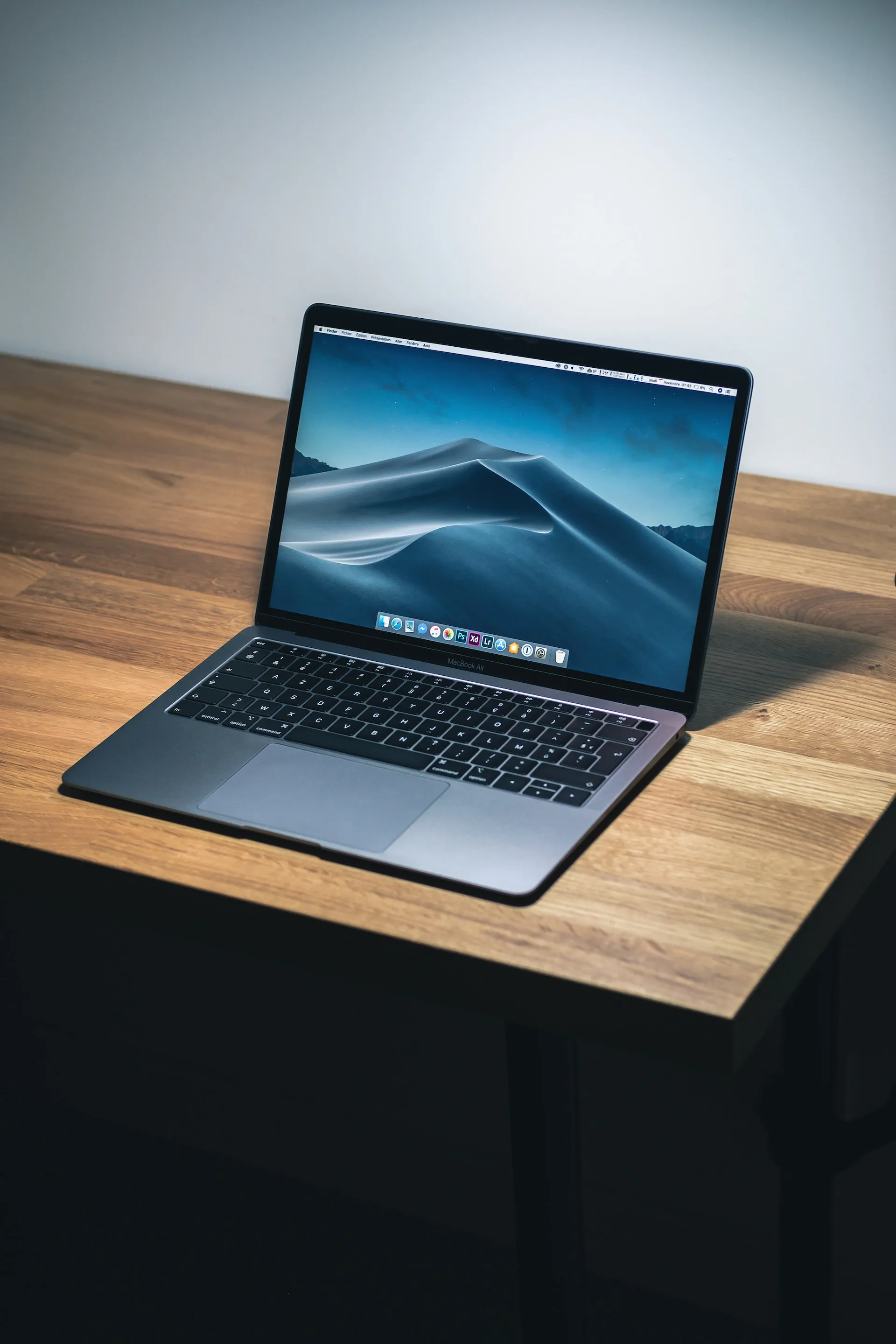 Laptop on a desk, ready to run the team inbox